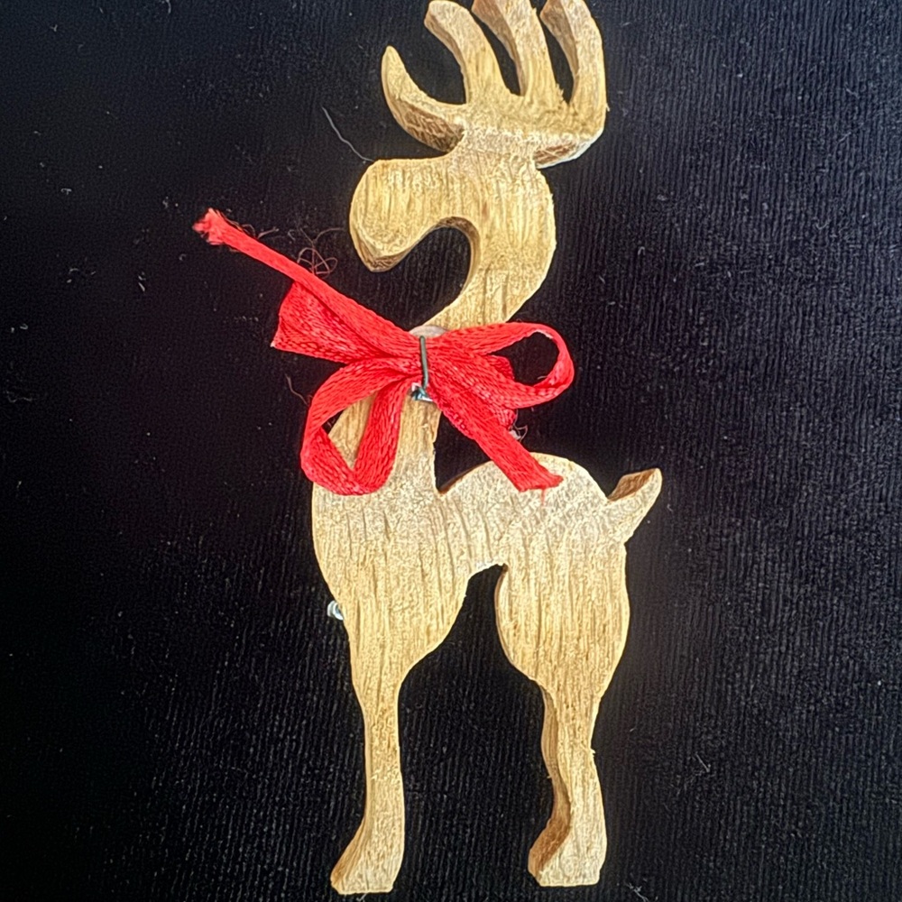 Handmade wooden reindeer brooch